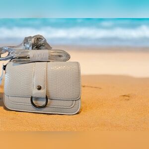 The drop white crossbody purse